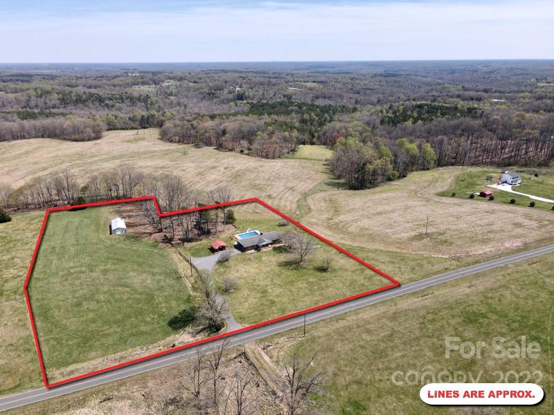 2122 Huckleberry Ridge Road Hiddenite, NC 28636 - Photo 3 of 40 an aerial view of a houses