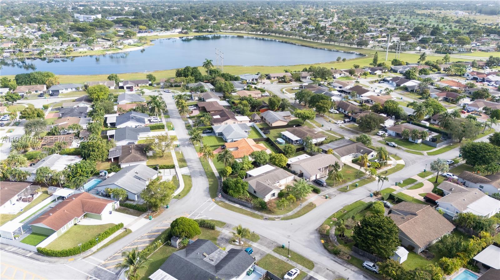 13249 Southwest 86th Lane Miami, FL 33183 - Photo 36 of 39 an aerial view of residential houses with outdoor space