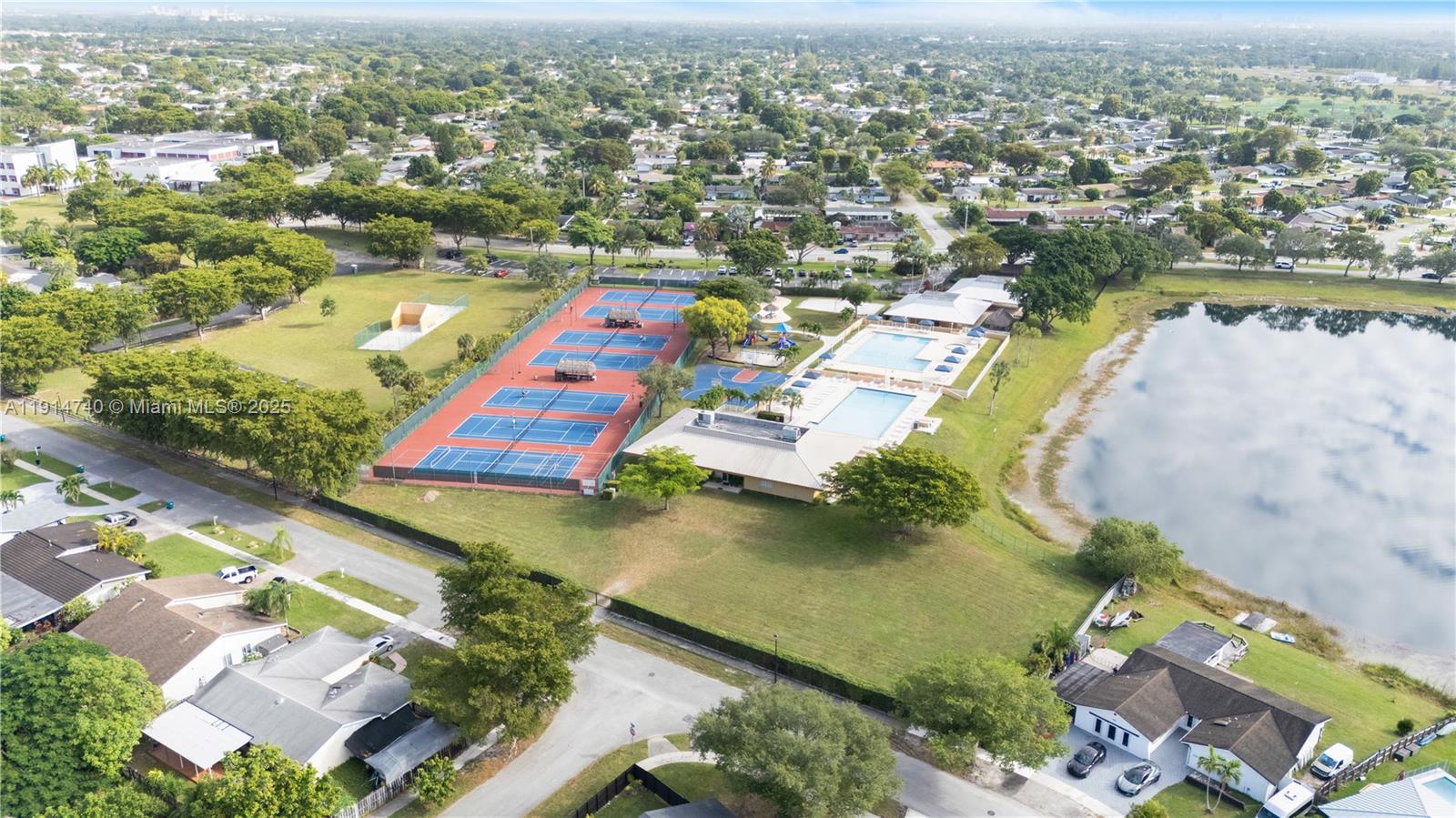 13249 Southwest 86th Lane Miami, FL 33183 - Photo 38 of 39 an aerial view of residential houses with outdoor space