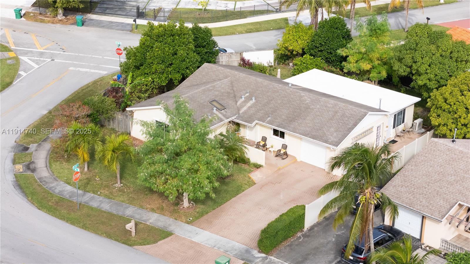13249 Southwest 86th Lane Miami, FL 33183 - Photo 6 of 39 an aerial view of a house with a yard and plants