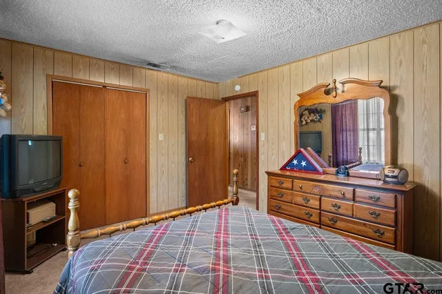 a view of room with furniture and a flat screen tv