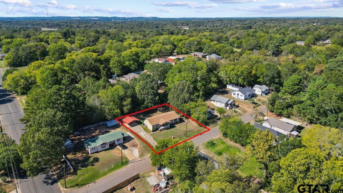 807 High Street Marshall, TX 75670 - Photo 6 of 33 an aerial view of a house with a yard