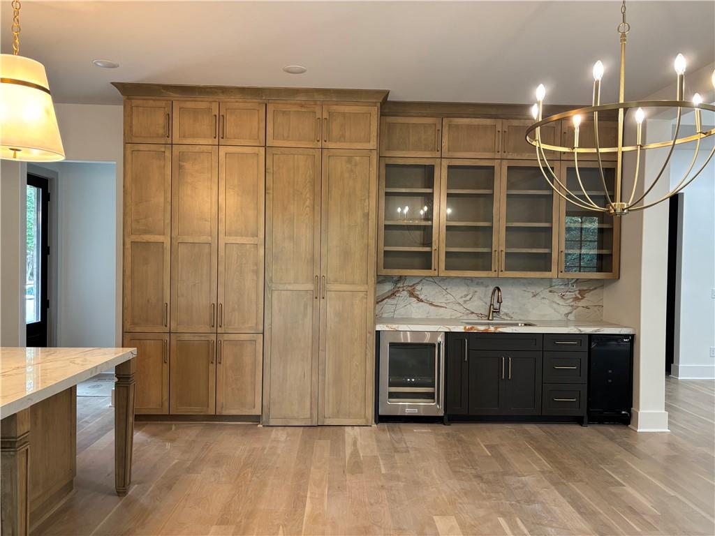 180 Thompson Place Roswell, GA 30075 - Photo 4 of 12 a spacious bathroom with a tub and a double vanity sink