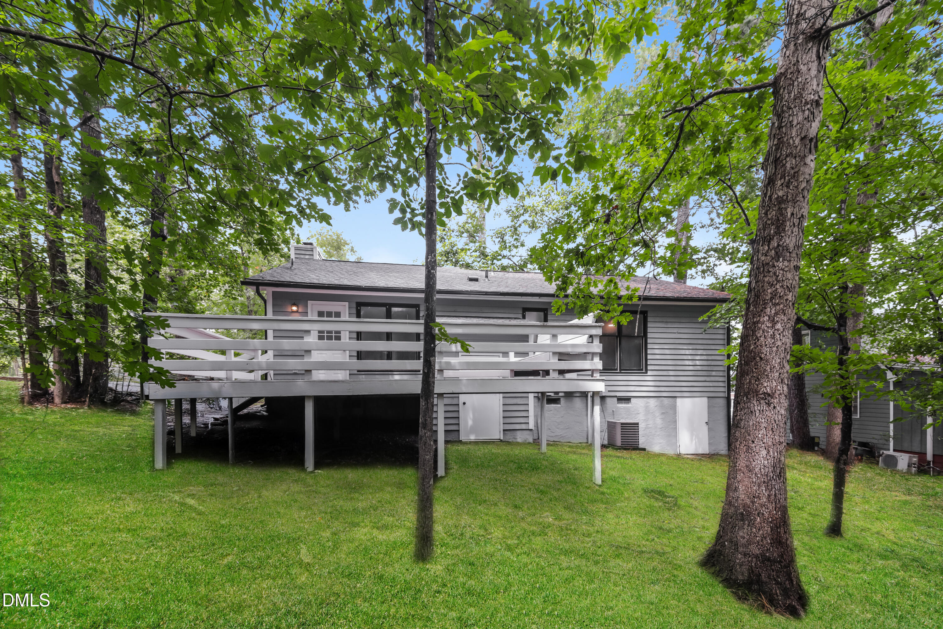 6 Fircrest Court Durham, NC 27703 - Photo 15 of 15 a view of house with backyard and a slide