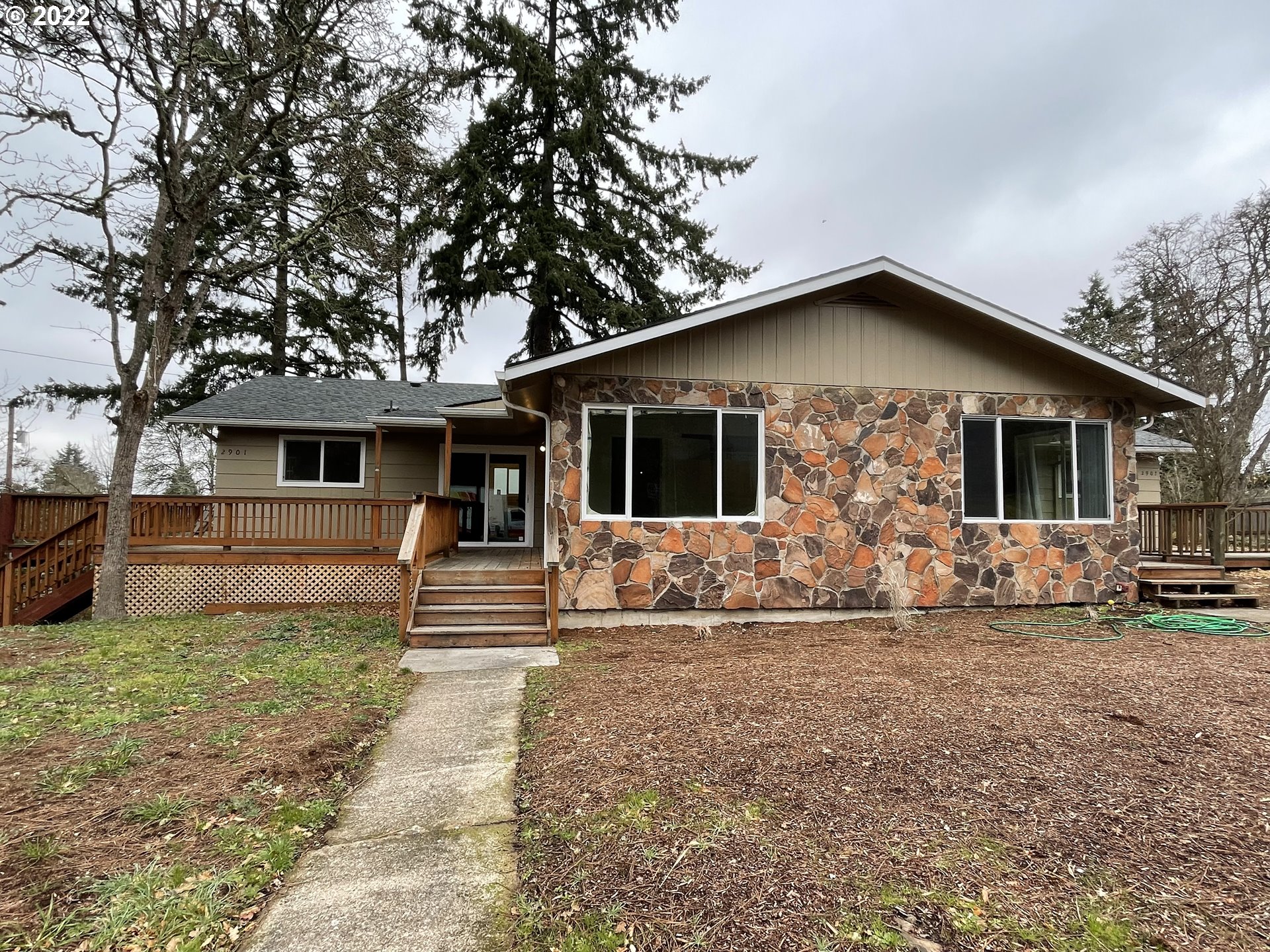 2901 Ingalls Way Eugene, OR 97405 - Photo 1 of 32 a front view of a house with a yard