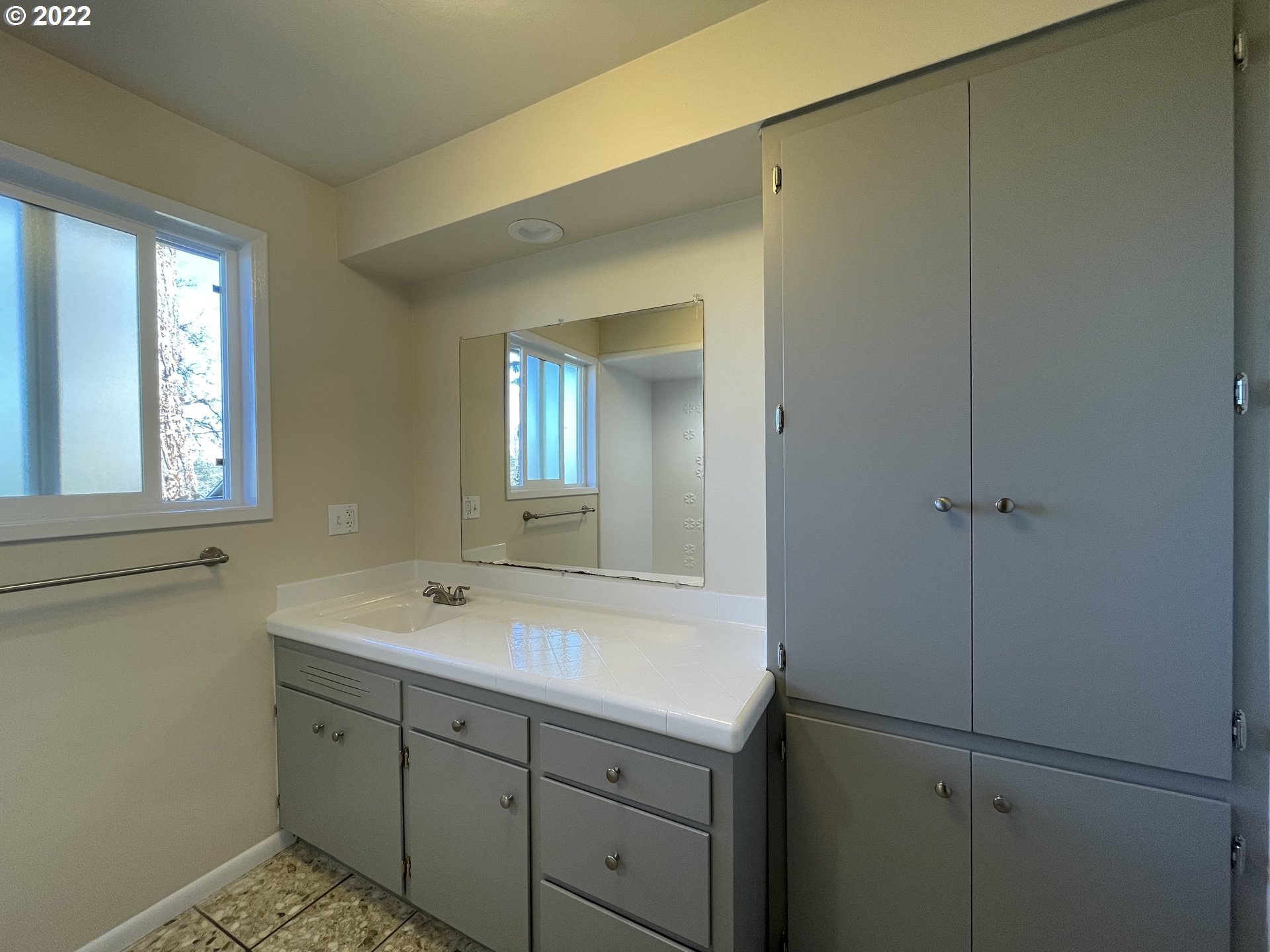2901 Ingalls Way Eugene, OR 97405 - Photo 30 of 32 a bathroom with a sink mirror and vanity