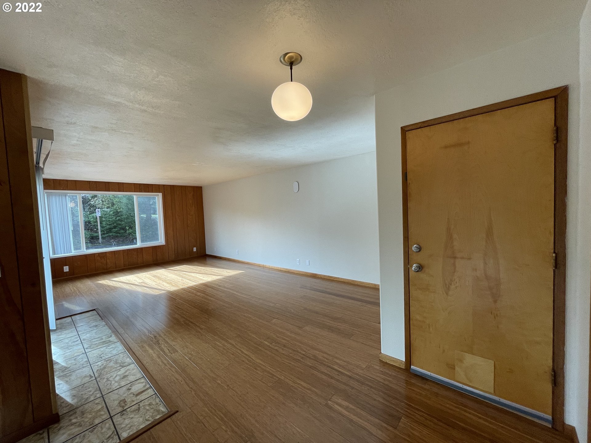2901 Ingalls Way Eugene, OR 97405 - Photo 8 of 32 a view of empty room with wooden floor and fan