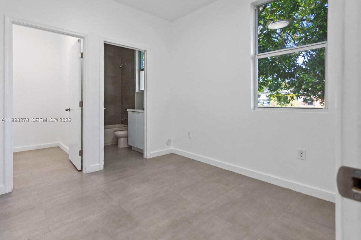 1935 Northwest 71st Street, Unit B Miami, FL 33147 - Photo 9 of 26