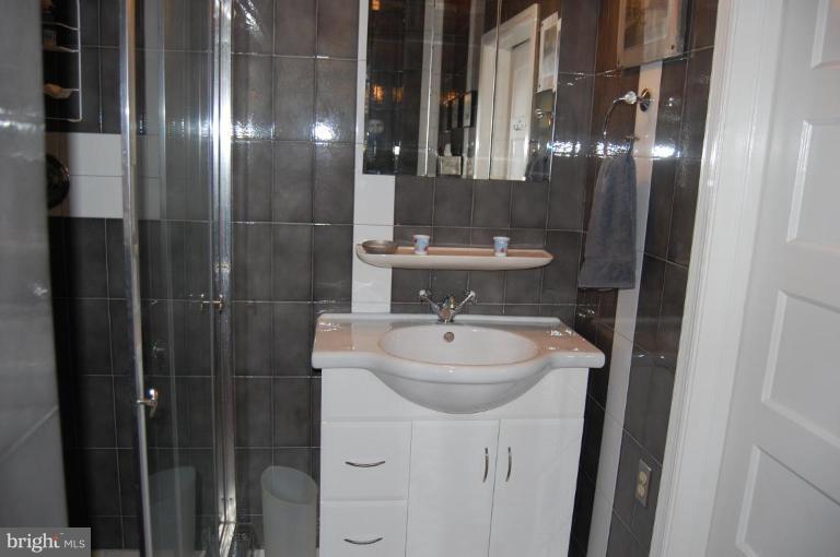 3921 Canterbury Road Baltimore, MD 21218 - Photo 26 of 27 Master bedroom bath with shower