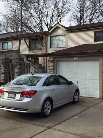 212 West Coventry Place Mount Prospect, IL 60056 - Photo 1 of 21 a car parked in front of a house