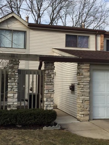 212 West Coventry Place Mount Prospect, IL 60056 - Photo 2 of 21 a view of a house with a yard