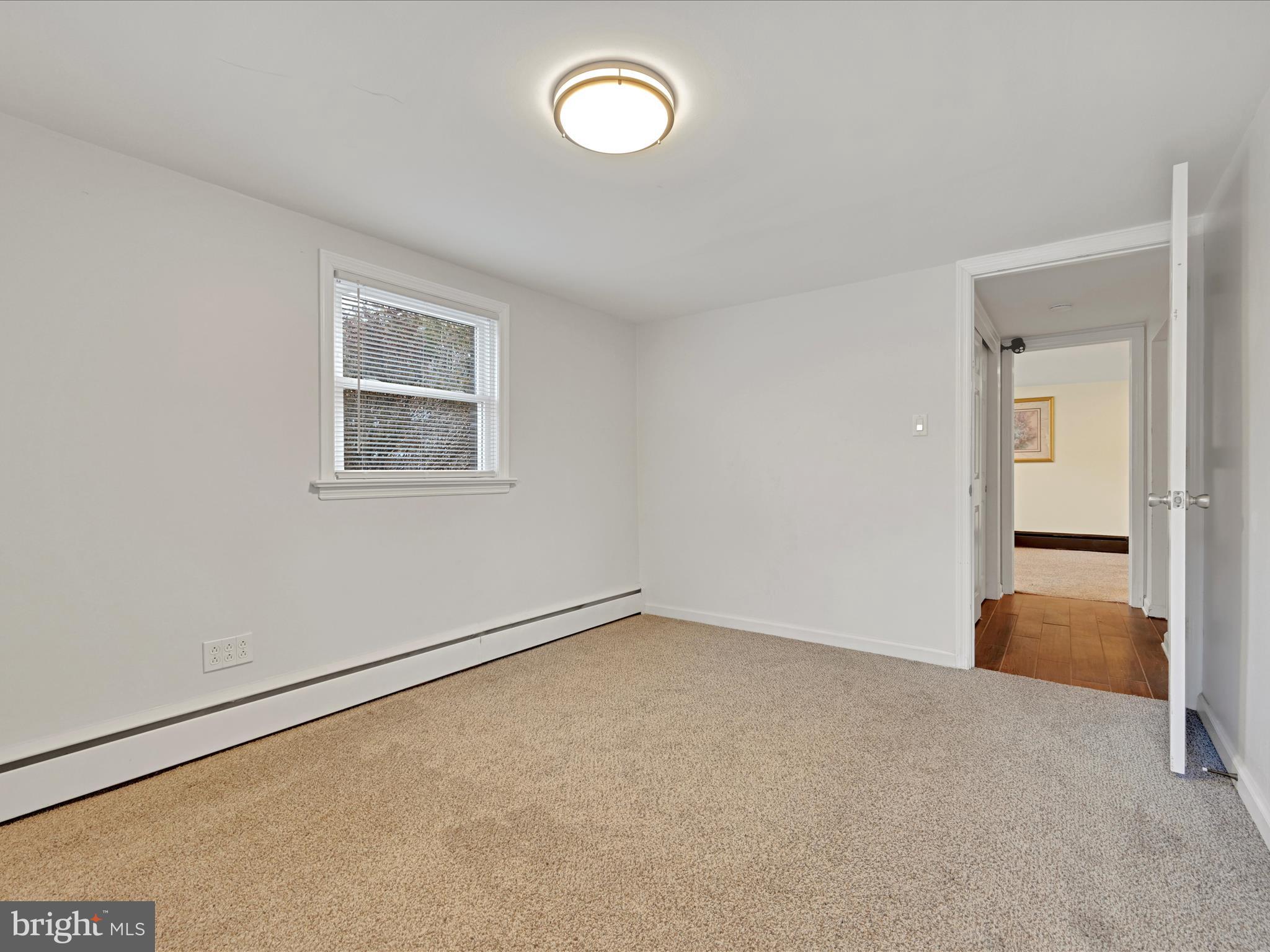 4500 Channing Road Wilmington, DE 19802 - Photo 25 of 35 an empty room with a window