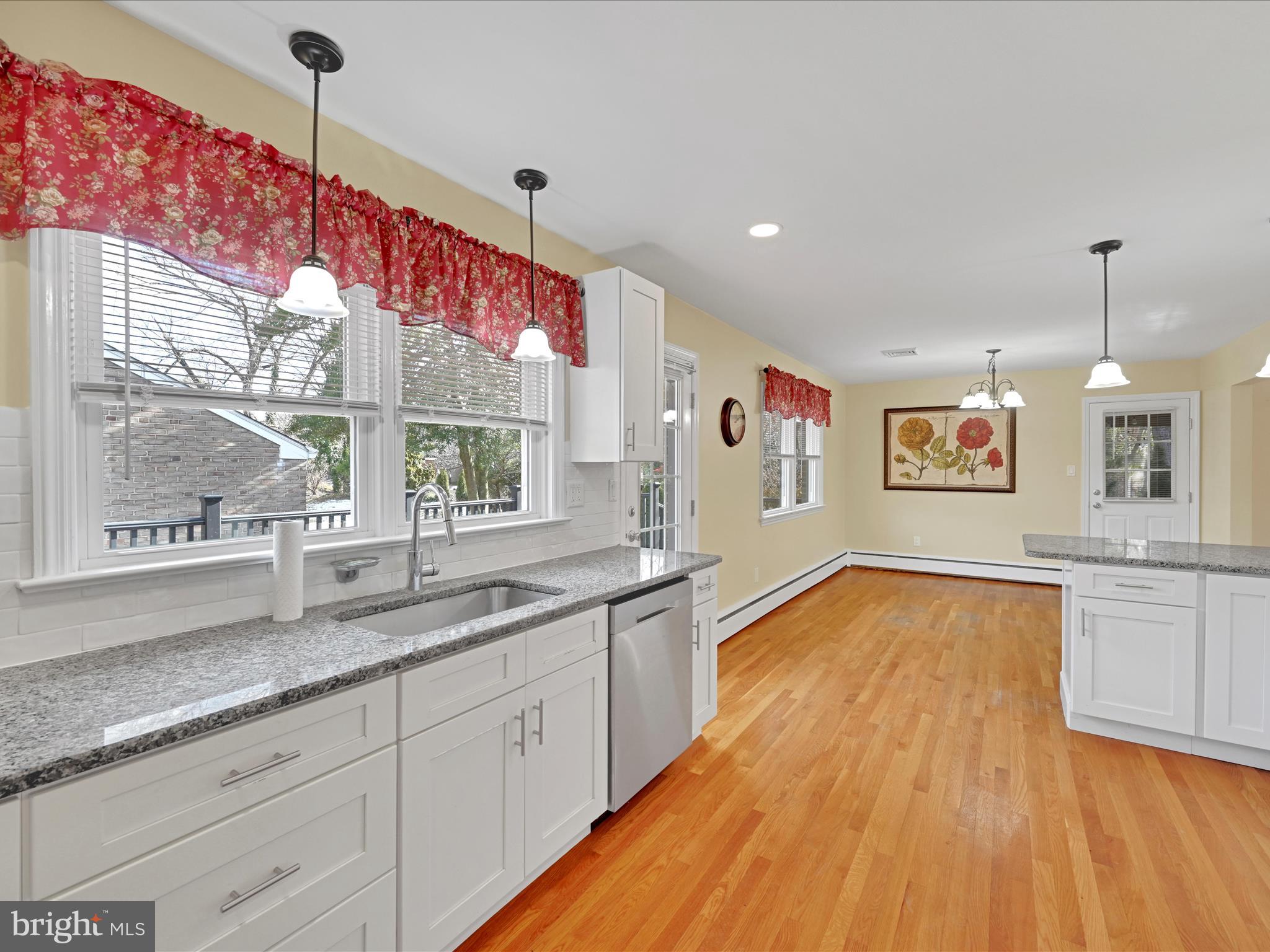 4500 Channing Road Wilmington, DE 19802 - Photo 8 of 35 a kitchen with sink and wooden floor