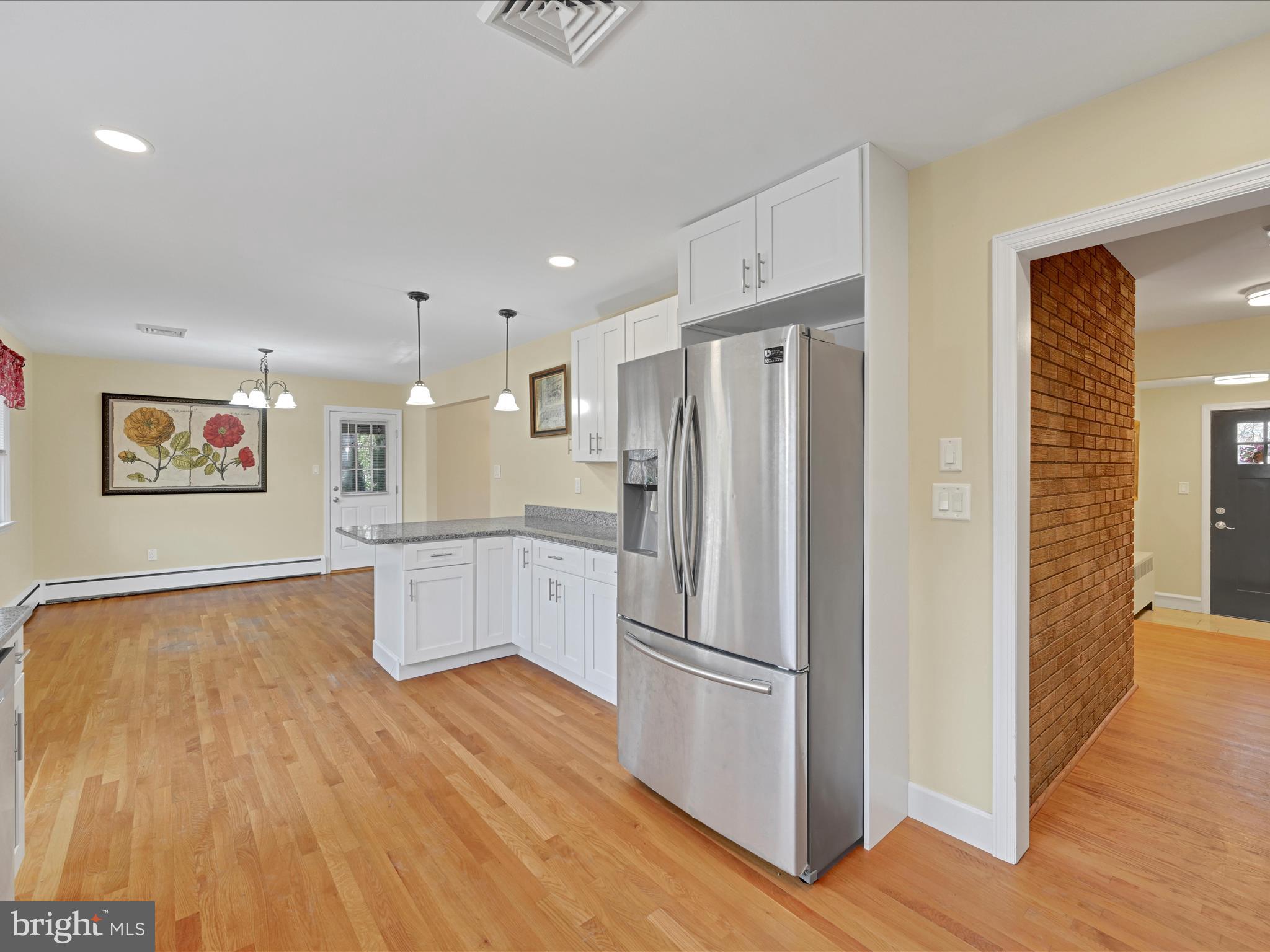 4500 Channing Road Wilmington, DE 19802 - Photo 10 of 35 a kitchen with stainless steel appliances a refrigerator and a stove top oven