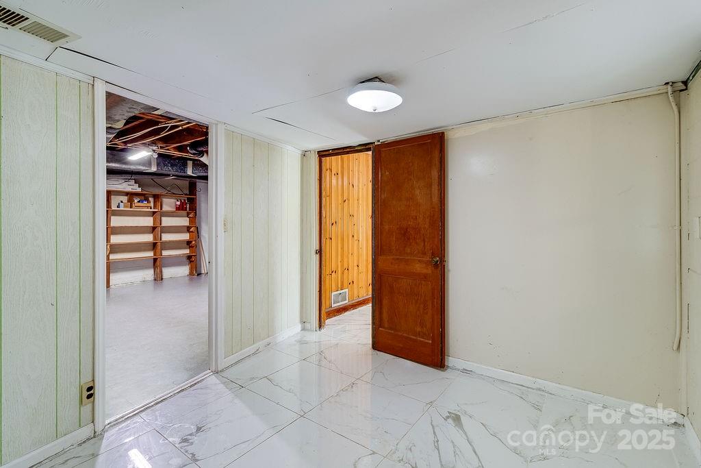 209 Park Street Morganton, NC 28655 - Photo 23 of 35 a view of an empty room and window