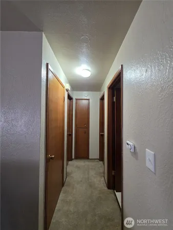 a workspace with furniture and window