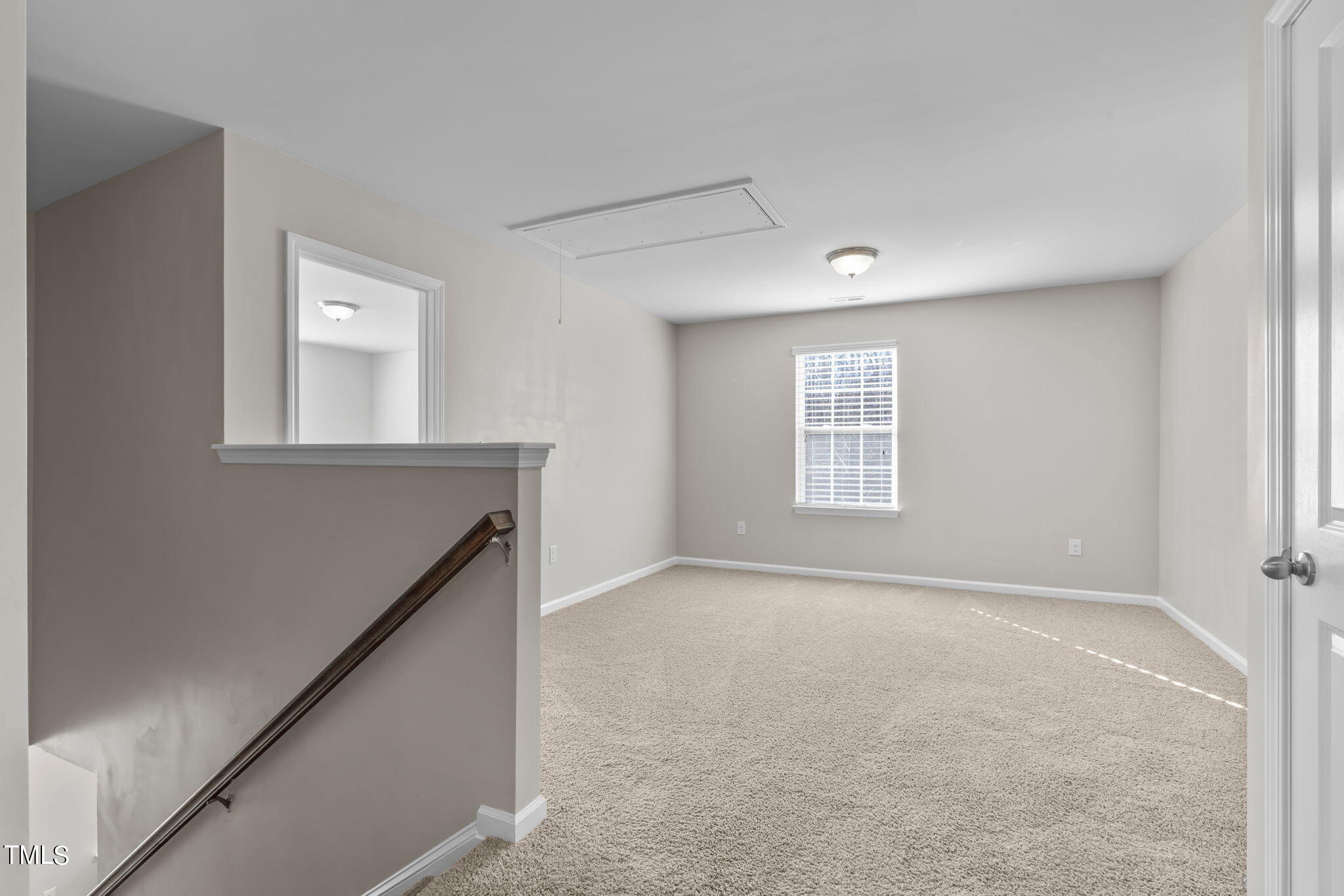 3652 Tule Spring Street Raleigh, NC 27610 - Photo 25 of 51 an empty room with windows