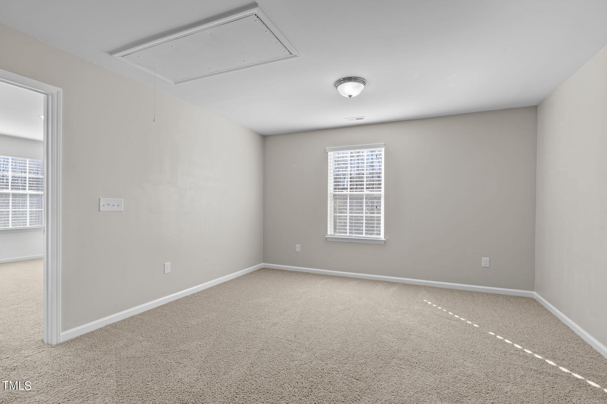 3652 Tule Spring Street Raleigh, NC 27610 - Photo 26 of 51 an empty room with windows