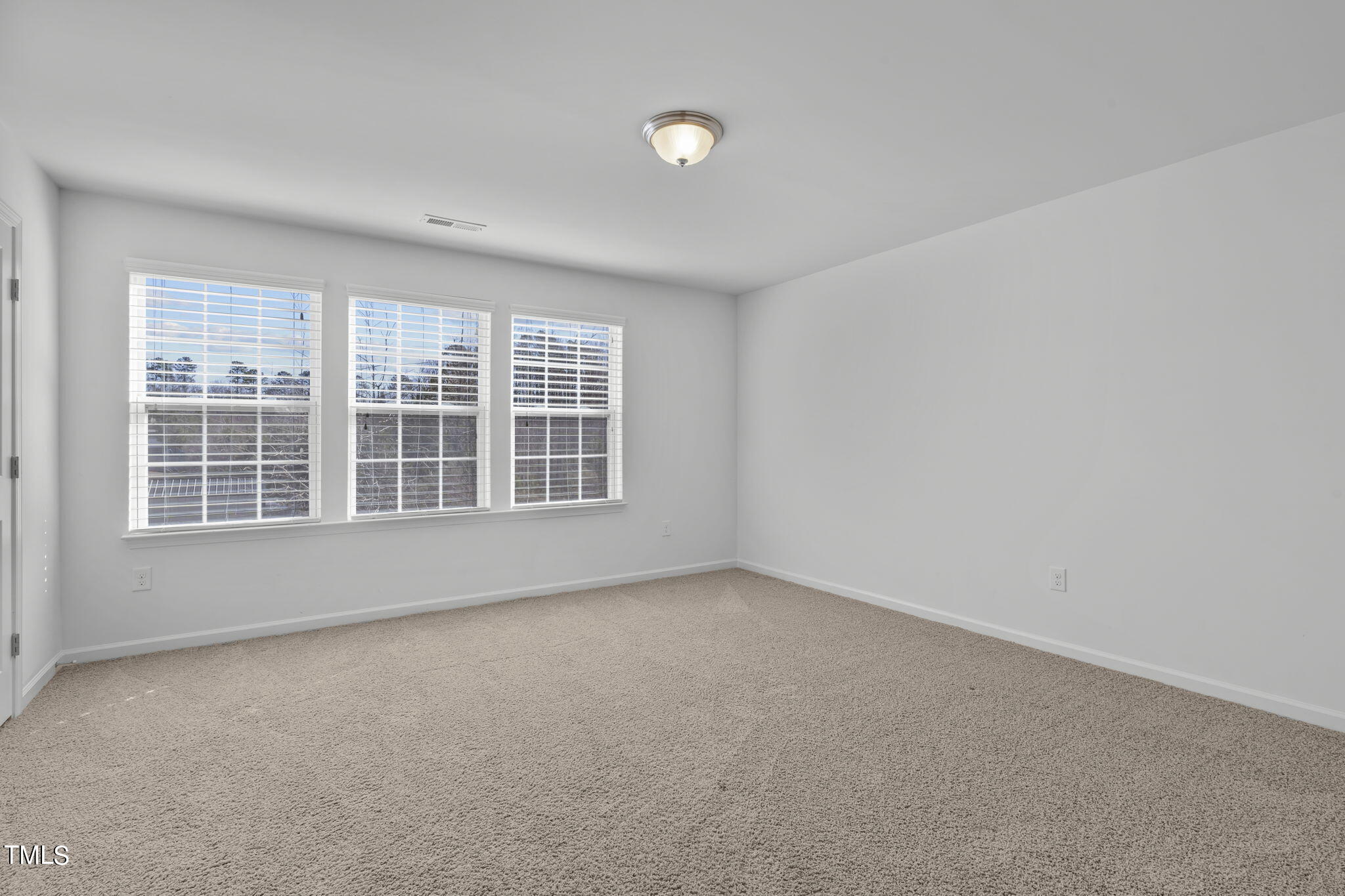3652 Tule Spring Street Raleigh, NC 27610 - Photo 28 of 51 an empty room with a window