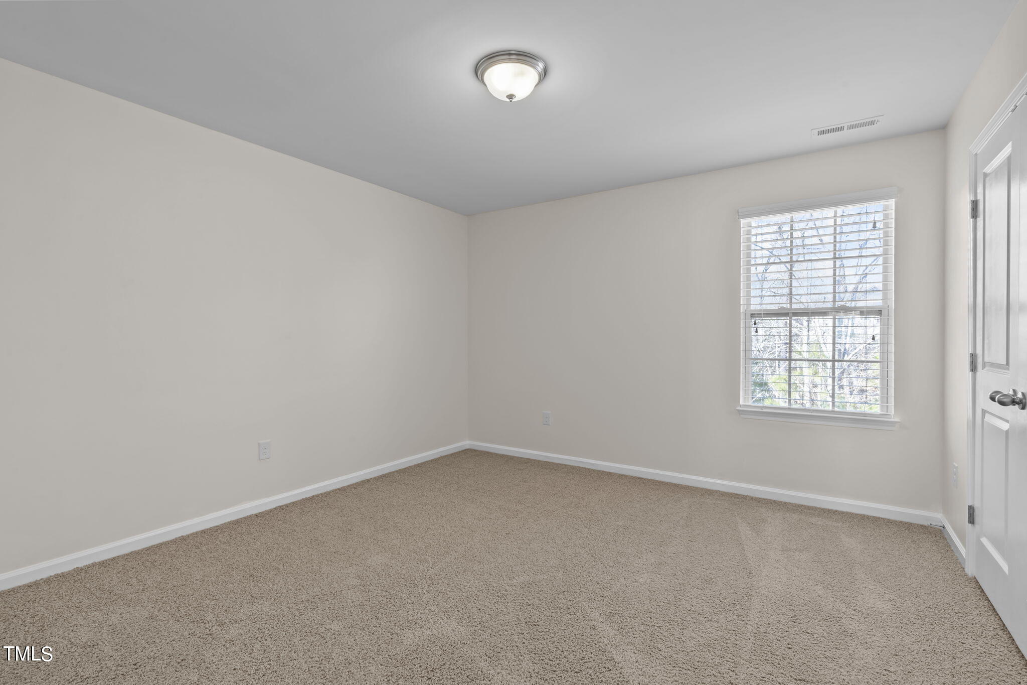 3652 Tule Spring Street Raleigh, NC 27610 - Photo 30 of 51 an empty room with a window