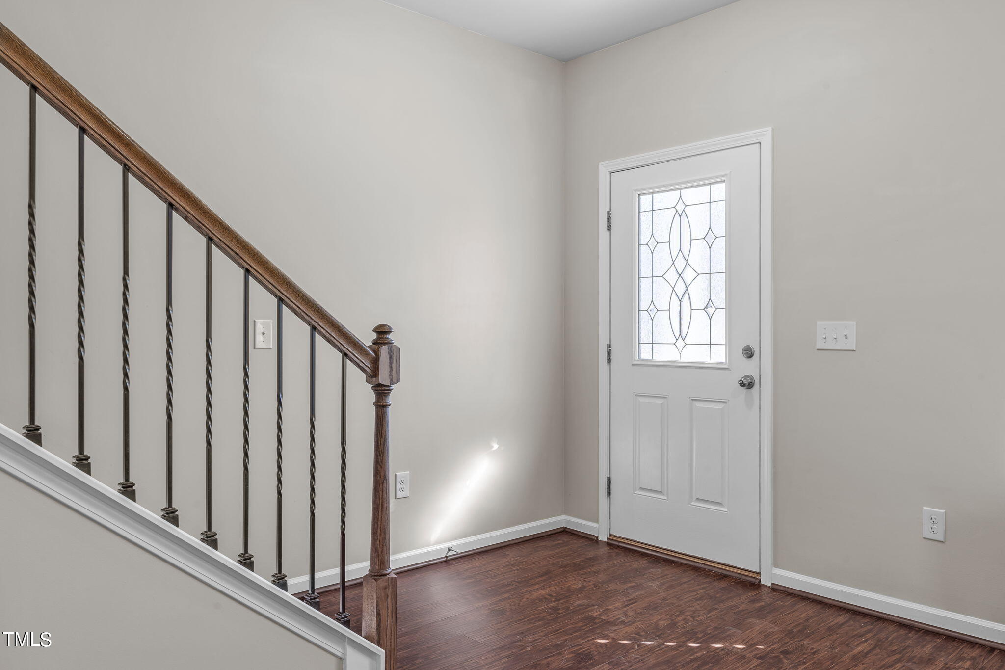 3652 Tule Spring Street Raleigh, NC 27610 - Photo 3 of 51 a view of an entryway with wooden floor