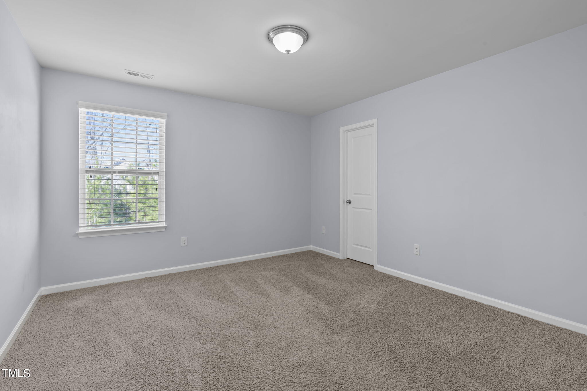 3652 Tule Spring Street Raleigh, NC 27610 - Photo 33 of 51 an empty room with windows
