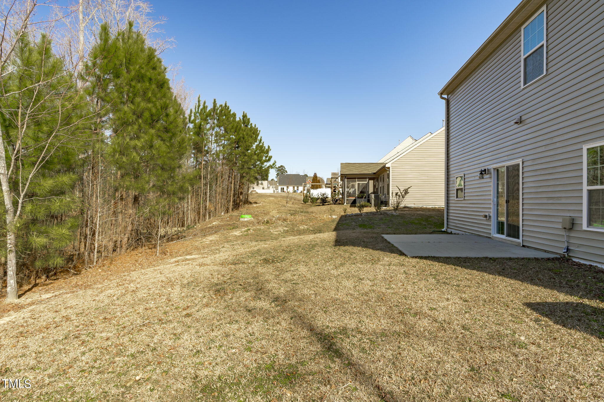 3652 Tule Spring Street Raleigh, NC 27610 - Photo 43 of 51 a view of a backyard of the house