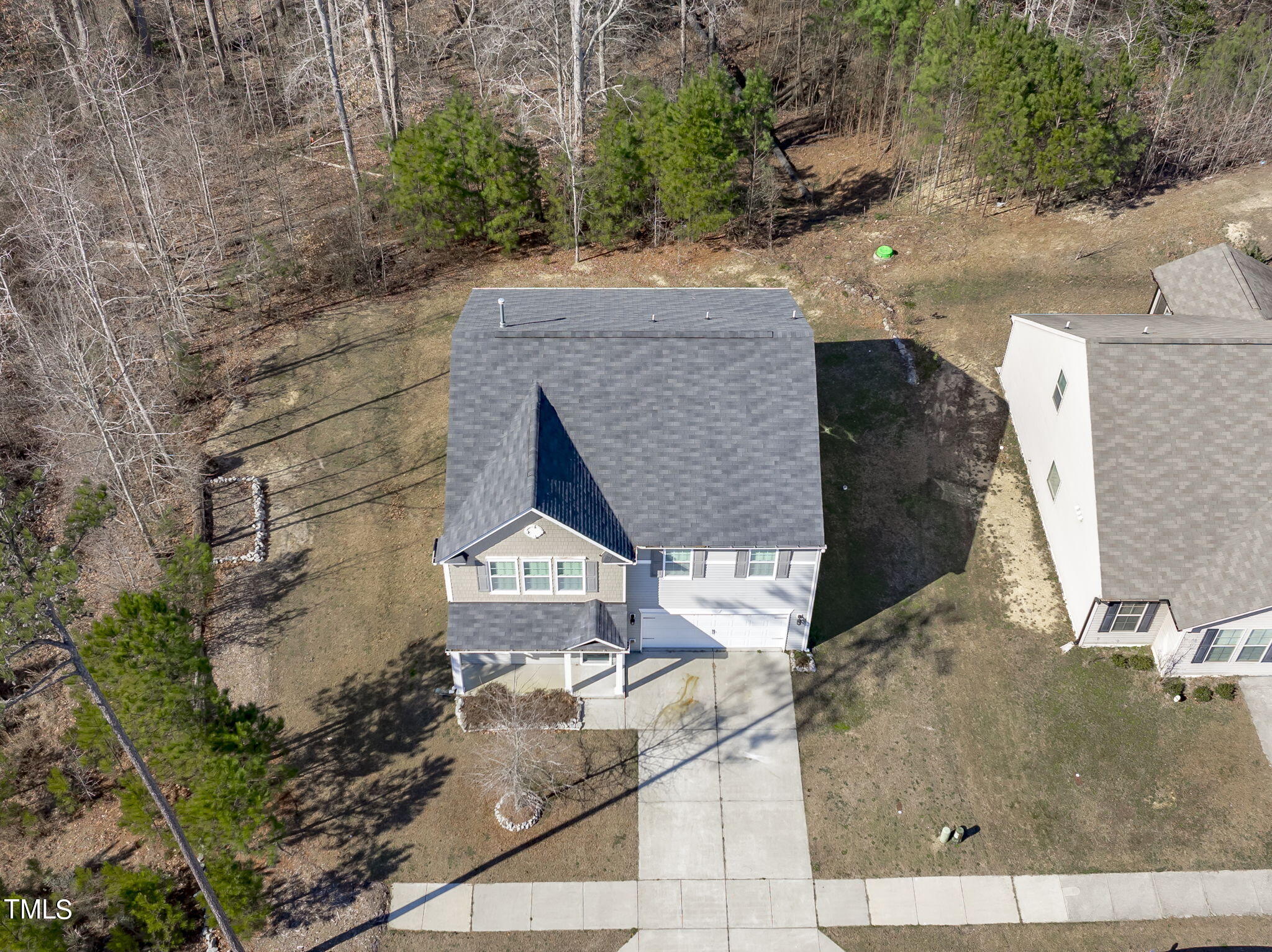 3652 Tule Spring Street Raleigh, NC 27610 - Photo 46 of 51 an aerial view of a house with yard