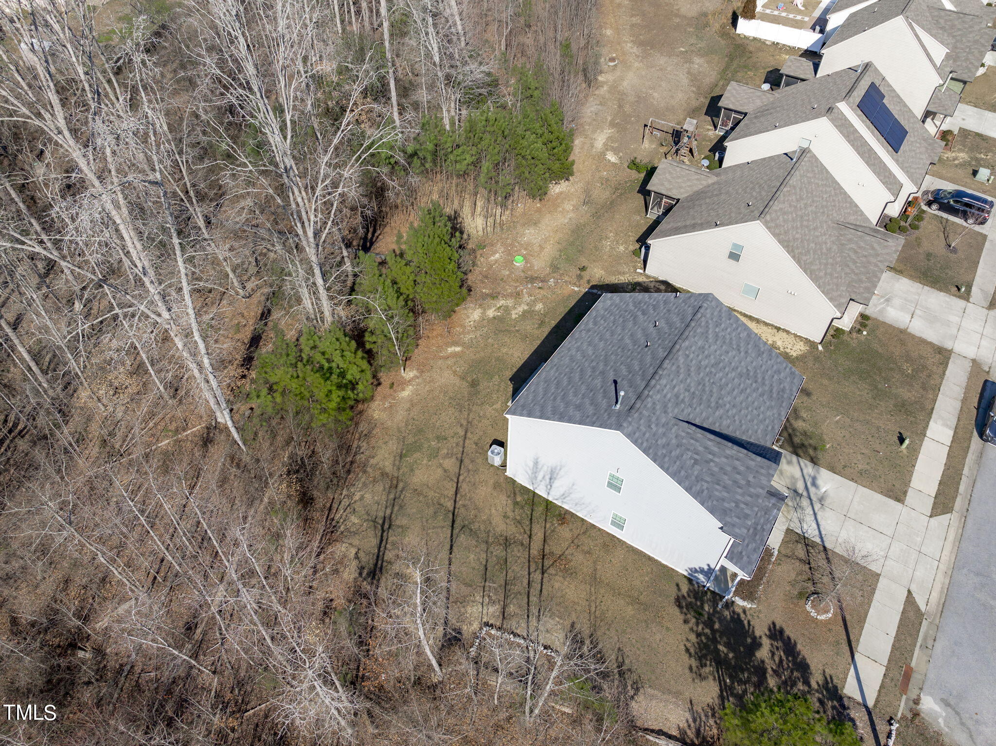 3652 Tule Spring Street Raleigh, NC 27610 - Photo 48 of 51 an aerial view of a house with a yard