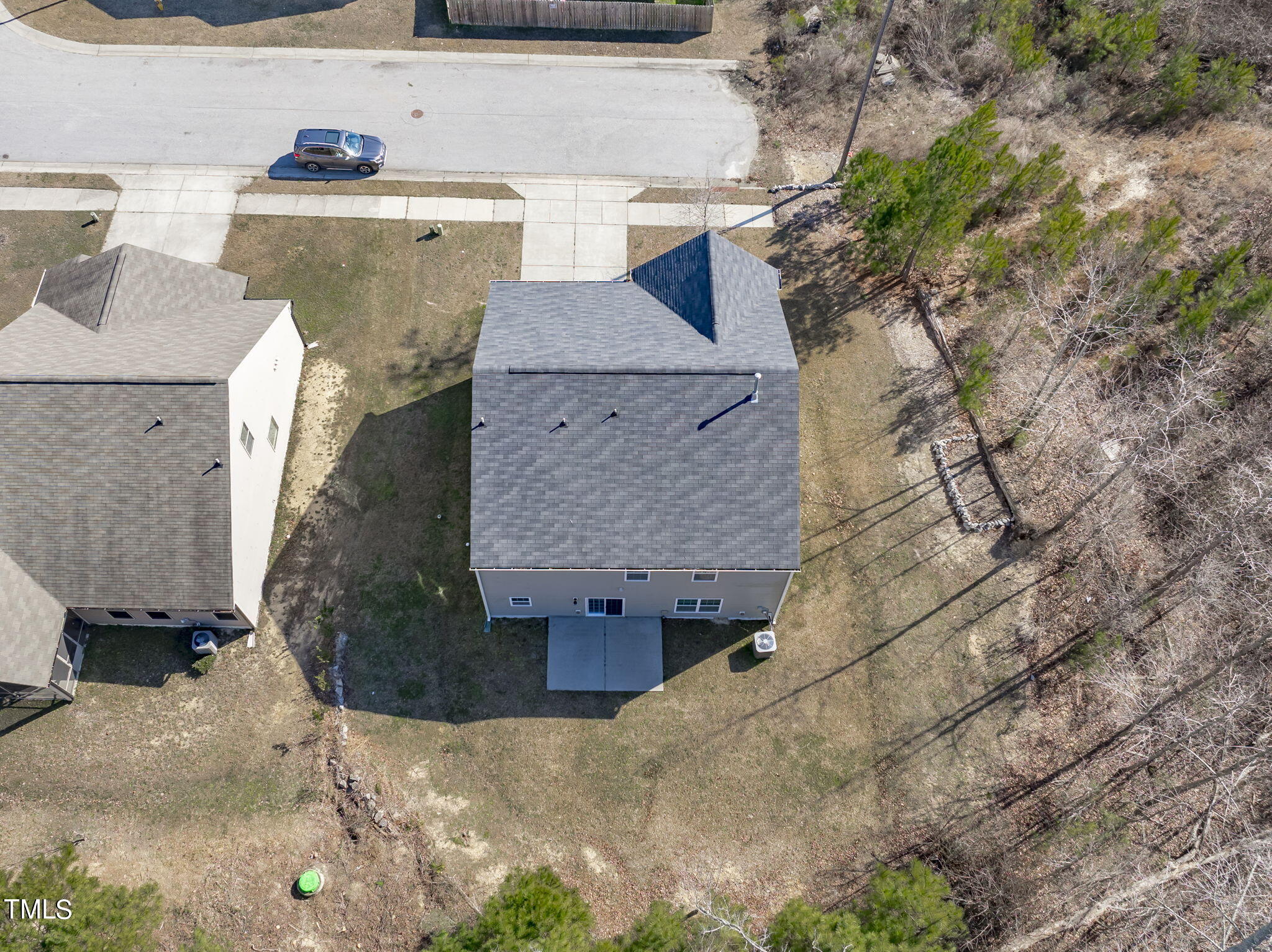 3652 Tule Spring Street Raleigh, NC 27610 - Photo 49 of 51 an aerial view of a house with a yard