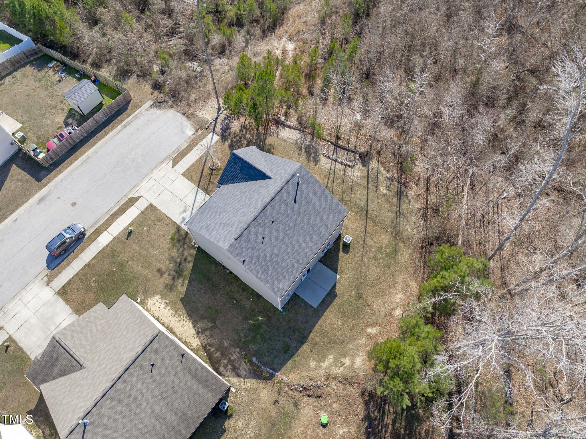 3652 Tule Spring Street Raleigh, NC 27610 - Photo 50 of 51 an aerial view of a house with a yard basket ball court and outdoor seating