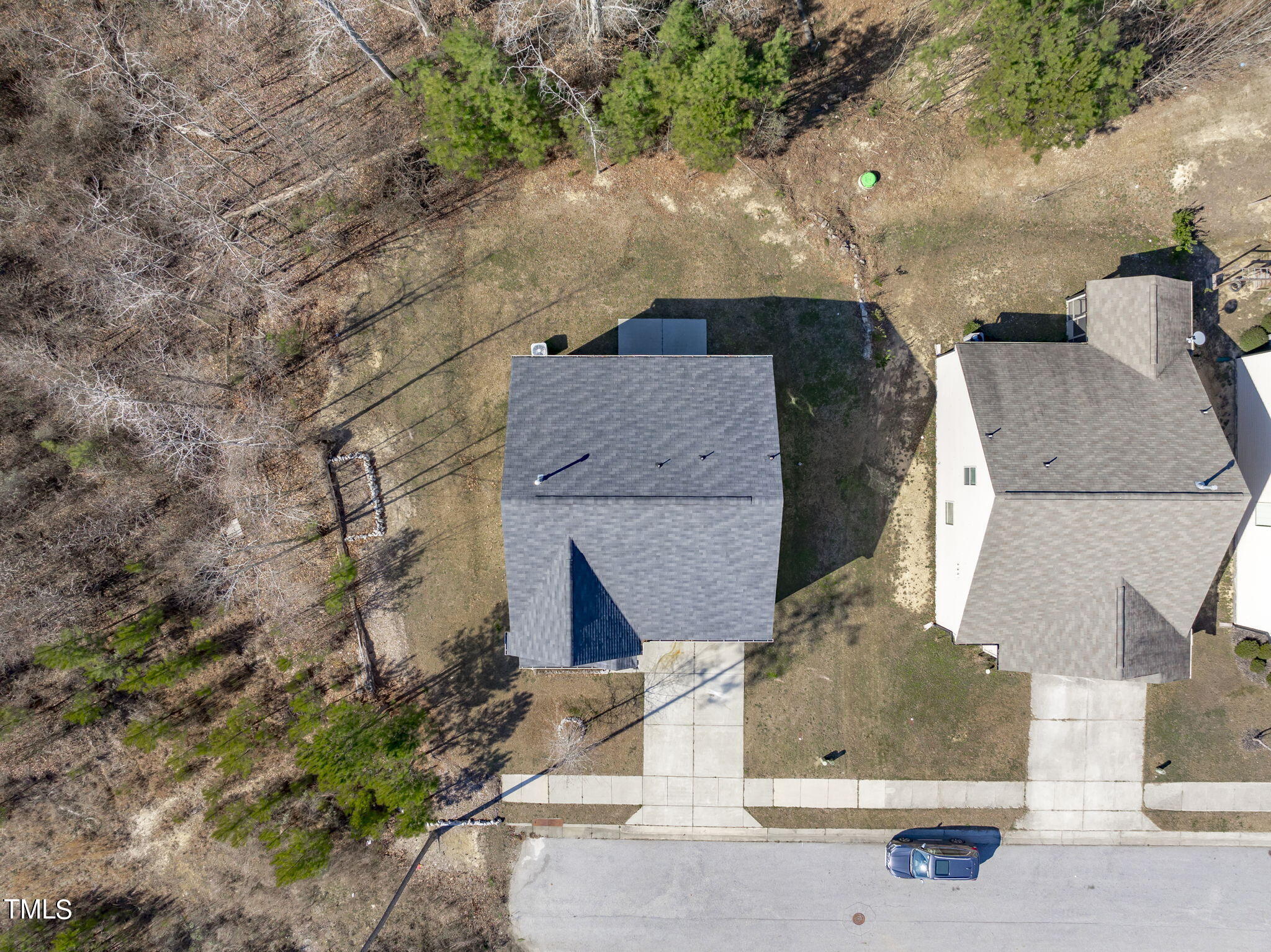 3652 Tule Spring Street Raleigh, NC 27610 - Photo 51 of 51 an aerial view of a house with a yard