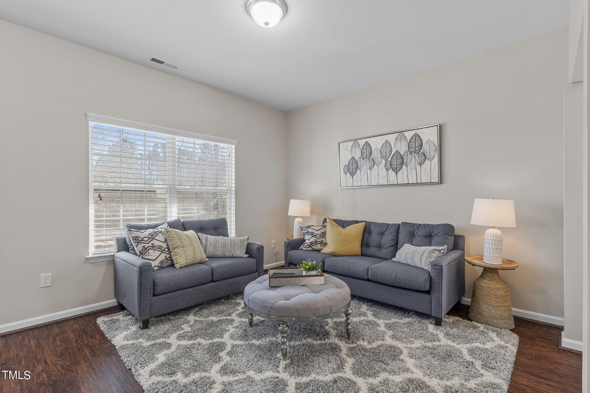3652 Tule Spring Street Raleigh, NC 27610 - Photo 6 of 51 a living room with furniture and a large window