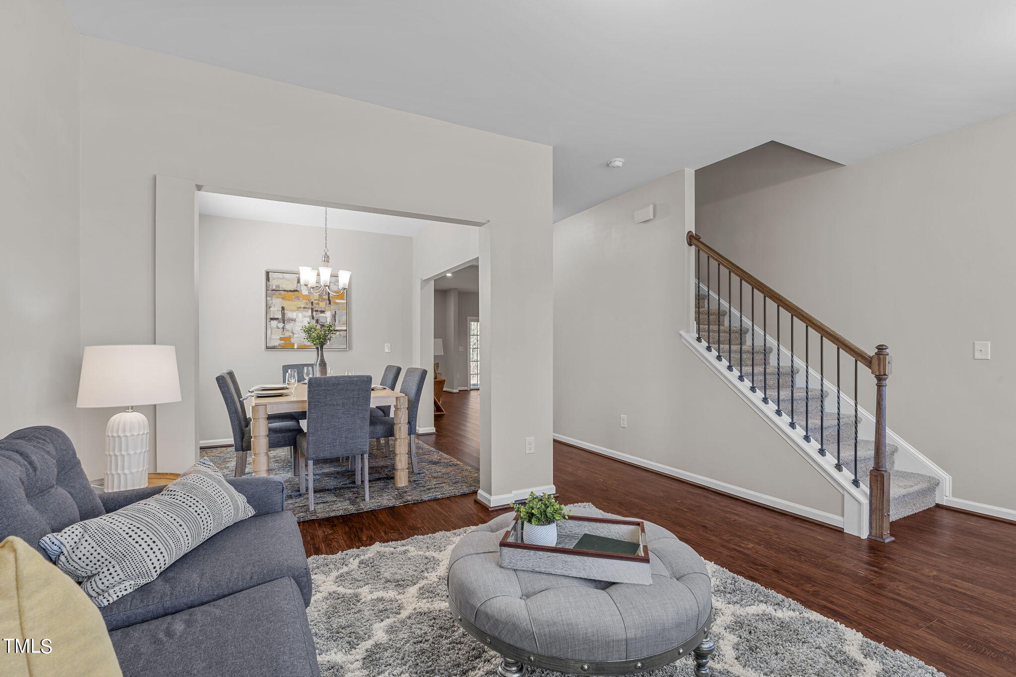 3652 Tule Spring Street Raleigh, NC 27610 - Photo 8 of 51 a living room with furniture and a wooden floor
