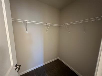 2267 Graywell Lane Duluth, GA 30096 - Photo 17 of 26 a view of a room with racks on the wall