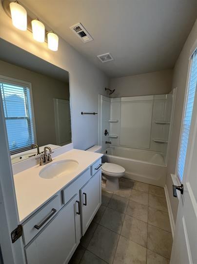 2267 Graywell Lane Duluth, GA 30096 - Photo 22 of 26 a bathroom with a sink a toilet and shower