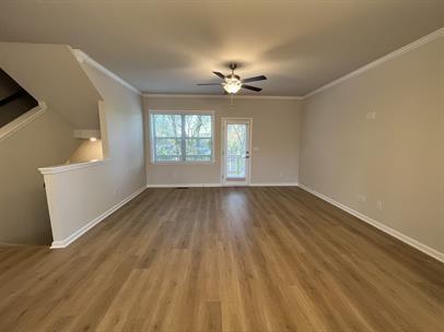 2267 Graywell Lane Duluth, GA 30096 - Photo 5 of 26 wooden floor in an empty room with a window