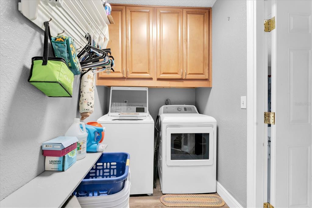 12107 72nd Way Largo, FL 33773 - Photo 29 of 40 a utility room with dryer and washer