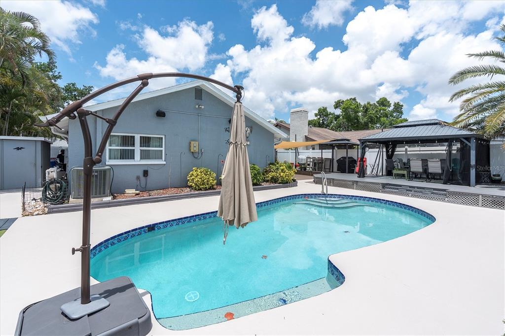 12107 72nd Way Largo, FL 33773 - Photo 31 of 40 a view of a house with pool