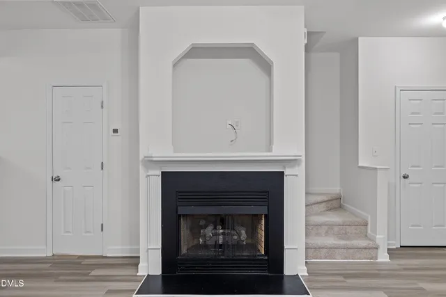 a living room with a fireplace