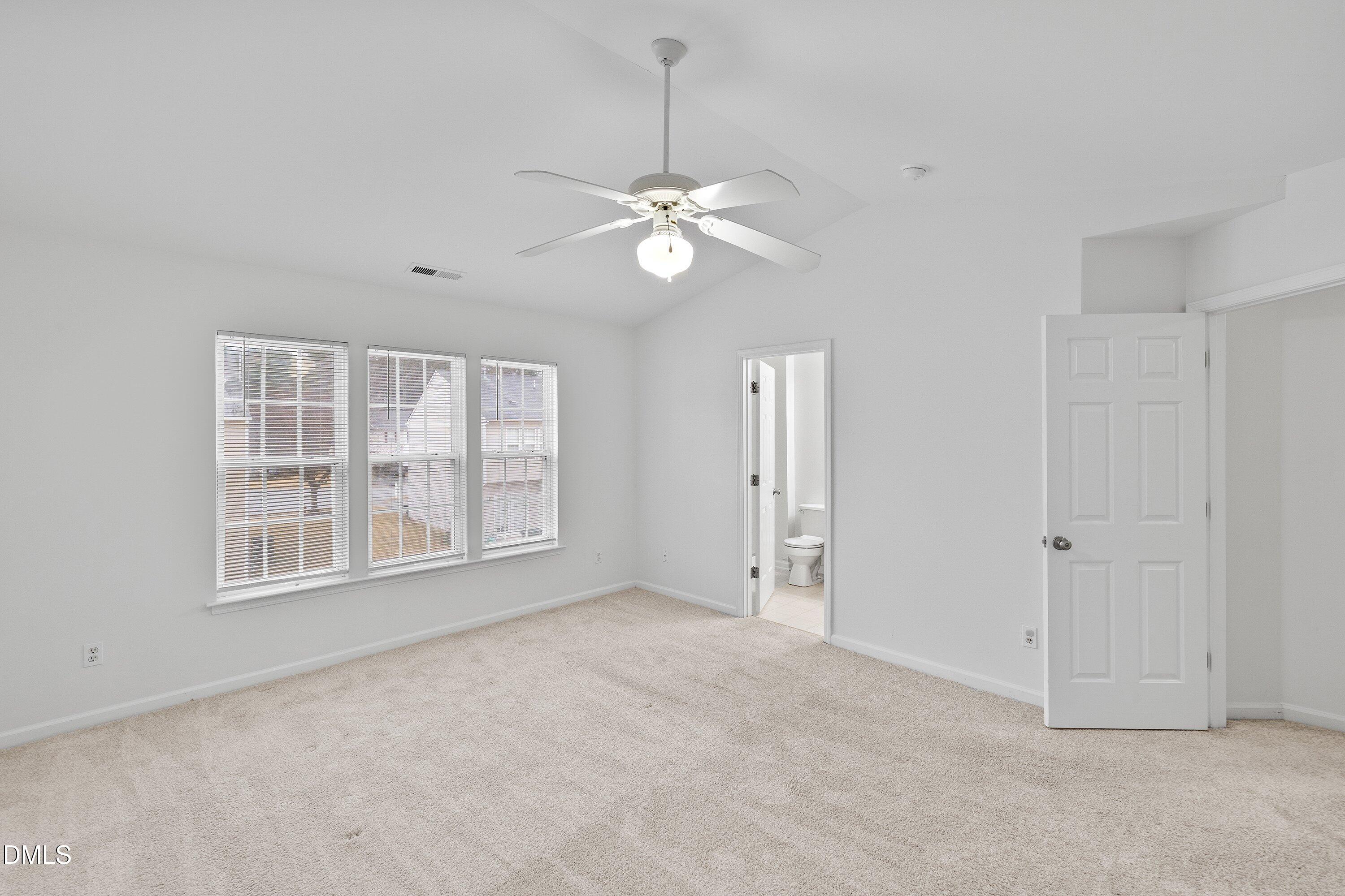 8321 Glenwood Springs Court Raleigh, NC 27616 - Photo 23 of 37 a view of an empty room with a window