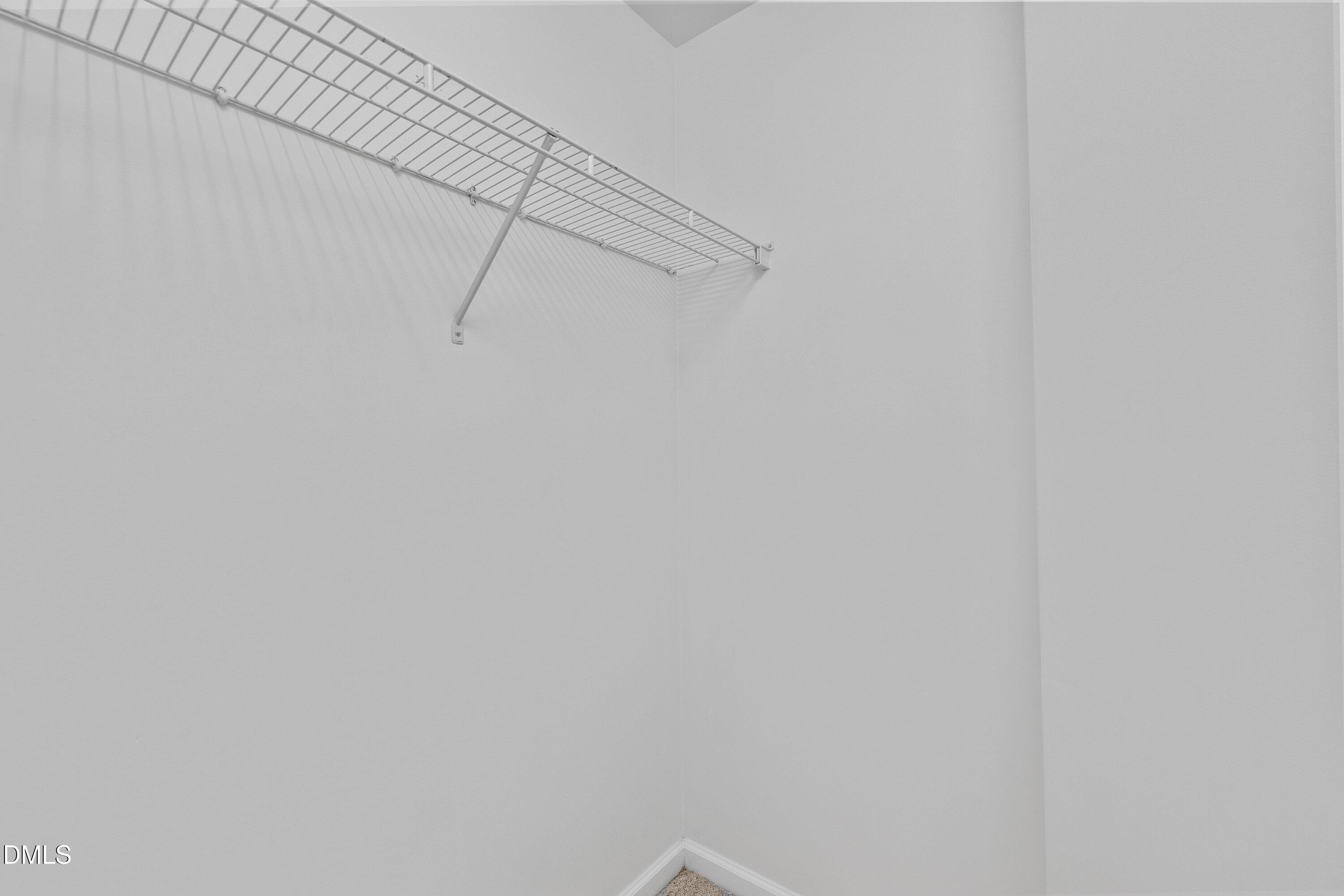 8321 Glenwood Springs Court Raleigh, NC 27616 - Photo 26 of 37 a view of a rack on the wall