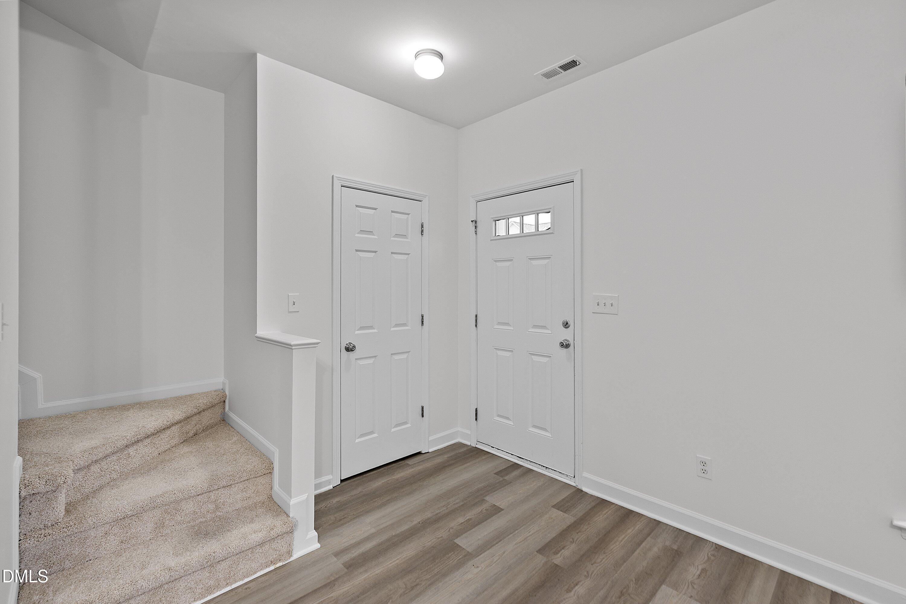 8321 Glenwood Springs Court Raleigh, NC 27616 - Photo 7 of 37 a view of an empty room