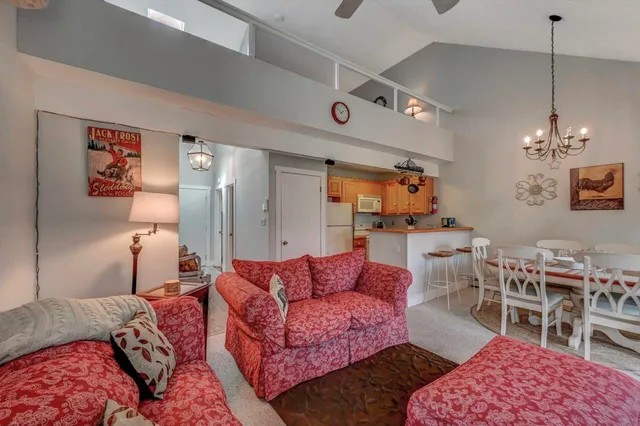 a bedroom with a bed and a mirror