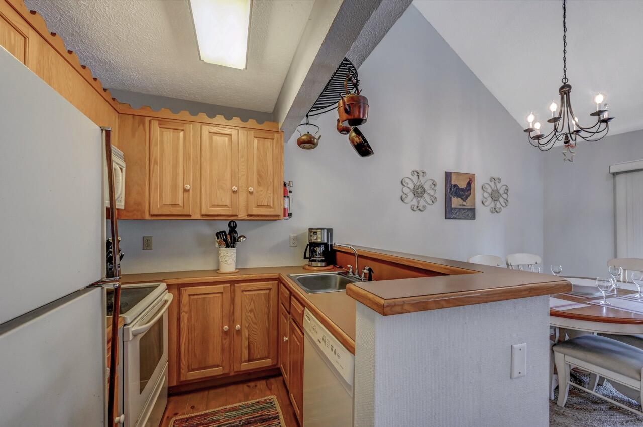 116 Snow Ridge Cir Lake Lake Harmony, PA 18624 - Photo 20 of 48 a kitchen with stainless steel appliances granite countertop a sink a stove and a refrigerator