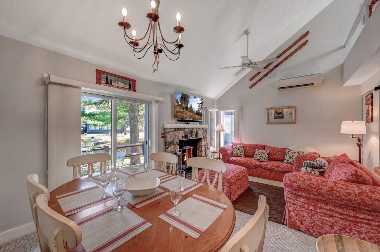 116 Snow Ridge Cir Lake Lake Harmony, PA 18624 - Photo 2 of 48 a living room with furniture a fireplace and a large window
