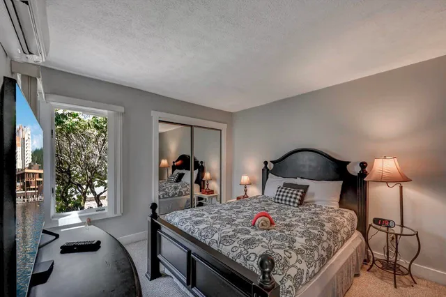 a living room with furniture and stairs