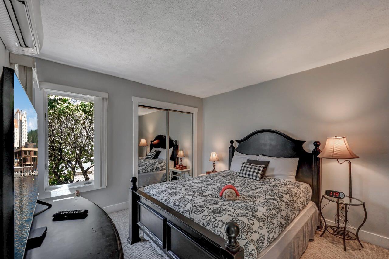 116 Snow Ridge Cir Lake Lake Harmony, PA 18624 - Photo 24 of 48 a bed sitting in a bedroom next to a window