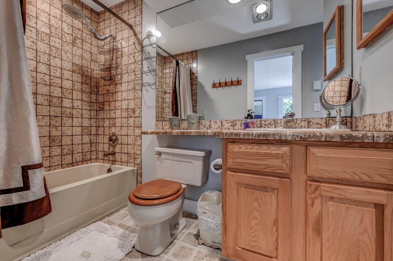 116 Snow Ridge Cir Lake Lake Harmony, PA 18624 - Photo 29 of 48 a bathroom with a granite countertop toilet sink and mirror