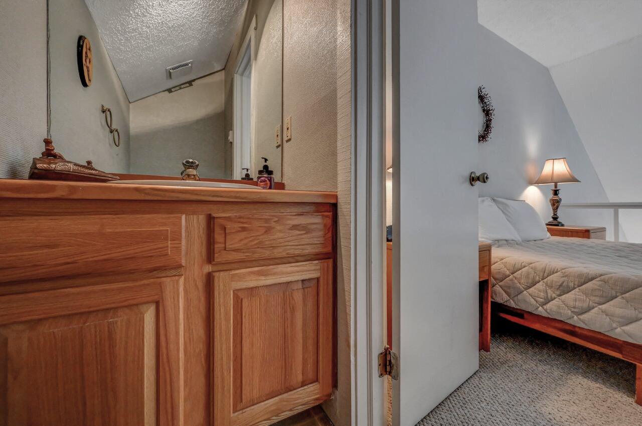 116 Snow Ridge Cir Lake Lake Harmony, PA 18624 - Photo 41 of 48 a bathroom with a sink and a mirror